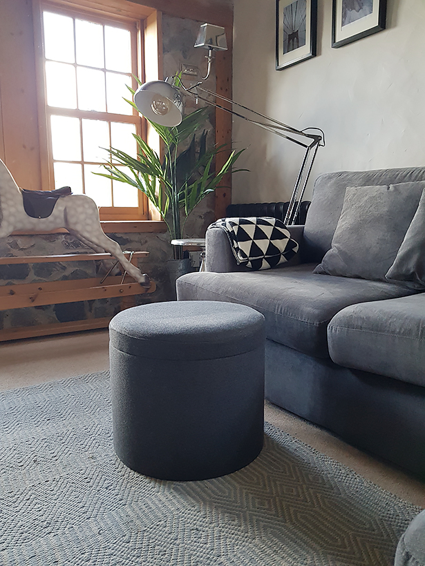 The Westhampton Grey storage foot stool in a stunning living room 