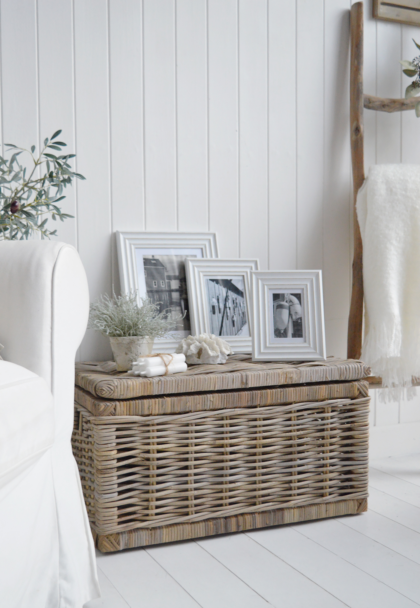 The Colebrook white photo frames displayed on the Seaside Basket