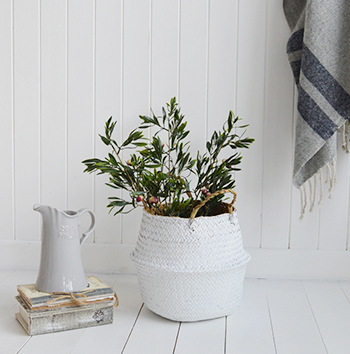 Add artificial greenery such as Eucalyptus, it complements the white interior so well and lives forever!