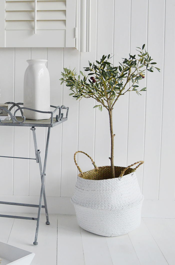 Realistic artificial olive tree shown in Kingston Baskets
