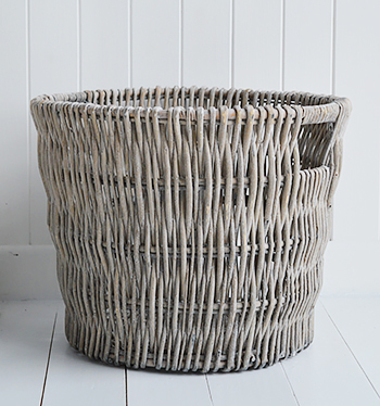 Round grey log basket