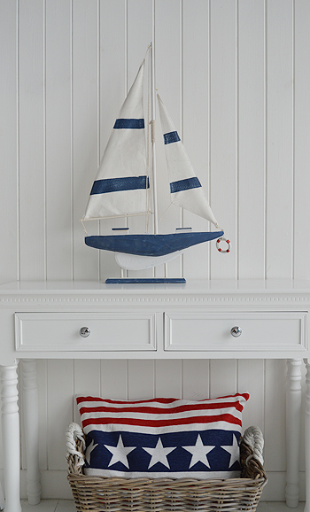 Decorative wooden boat in white and navy