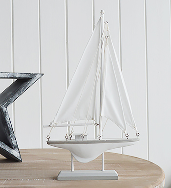 Arrange coastal accessories casually to relax the style and blend seemlessly into your home.