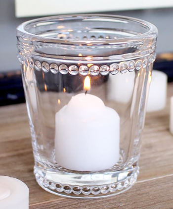 Glass candle holder for white home interiors and accessories