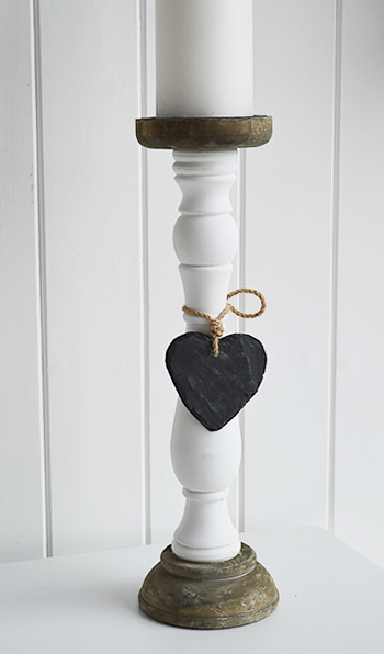 White candle holder with spike and heart