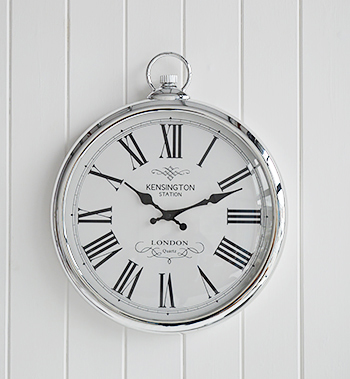 polished silver wall clock