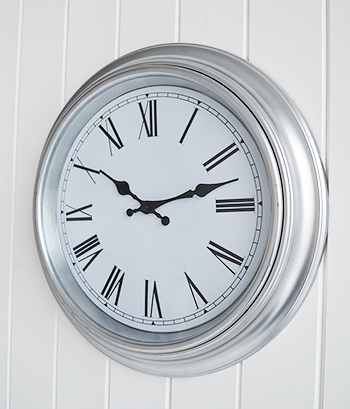 Silver and white wall clock