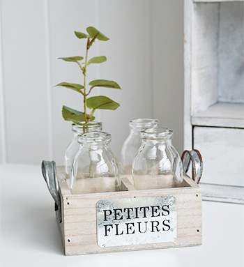 This small crate only takes up a corner on your dressing table, but gives some difference and makes a creative effect by adding your own greenery or flowers