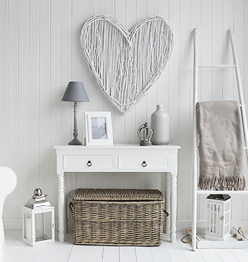 white living room with grey baskets under console table for extra storage furniture