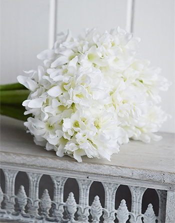 Realistic artificial bunch of white Hyacinths