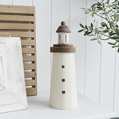 Luxury Chic Coastal nautical decorative accessories for the home by the sea. Wooden lighthouses 