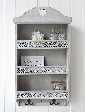 Parisian wall shelf with three shelves, two hooks and ornate front