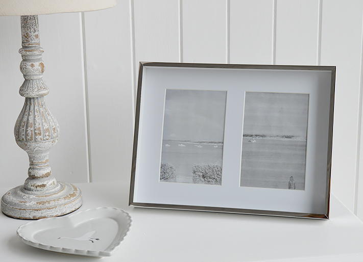 A double silver photoframe with white mount for two 6x4 photographs