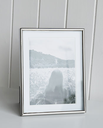 Silver photoframe for 5x7 photogrpah with white mount