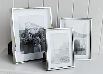Silver photo frames with white mount