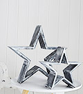 Large and small grey and white decorative stars