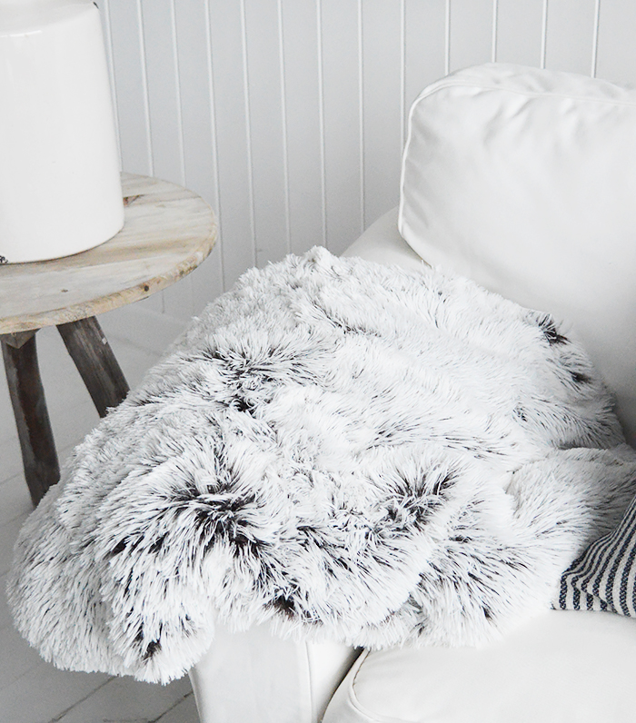 Luxurious cosy grey fur throw from The White Lighthouse Furniture