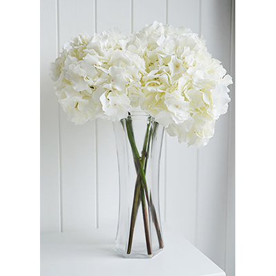 This is a very realistic and gorgeous looking stem of white Hydrangea, bunched together they are absoultely fabulous and will save you a small fortune as they last for years!