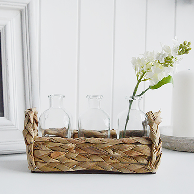 Newbury Small Glass Bud Vase in Straw Basket from The White Lighthouse coastal, New England and country furniture and home decor accessories UK