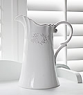 White ceramic vase or water jug