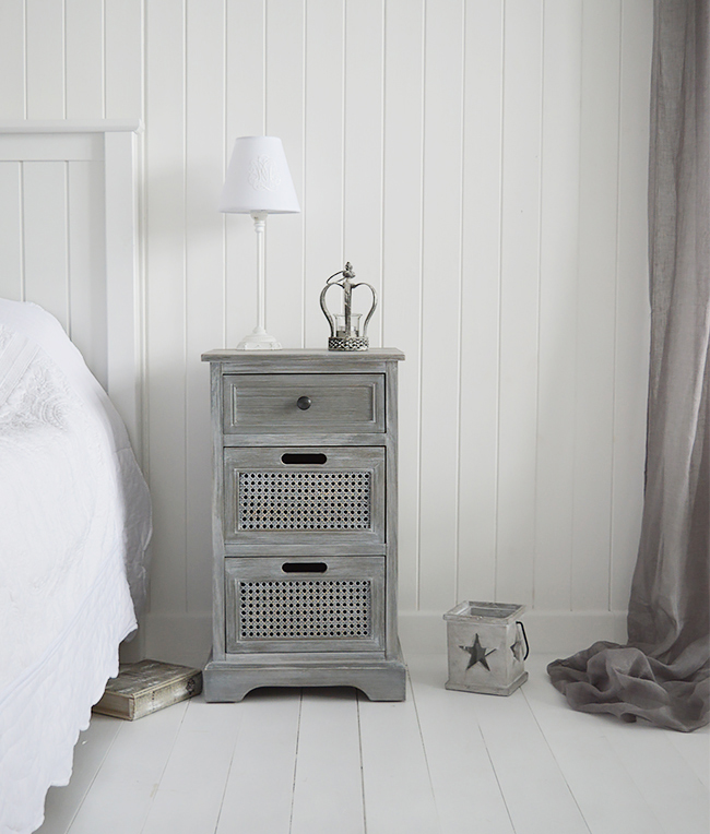 British Colonial Furniture. A grey bedside table with drawers