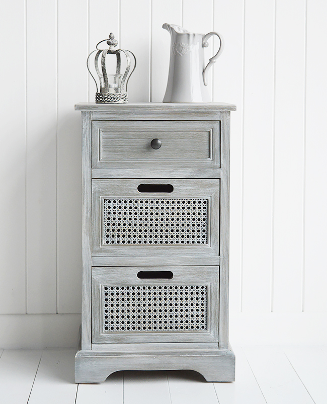 British Colonial Furniture. A grey lamp or bedside table with drawers
