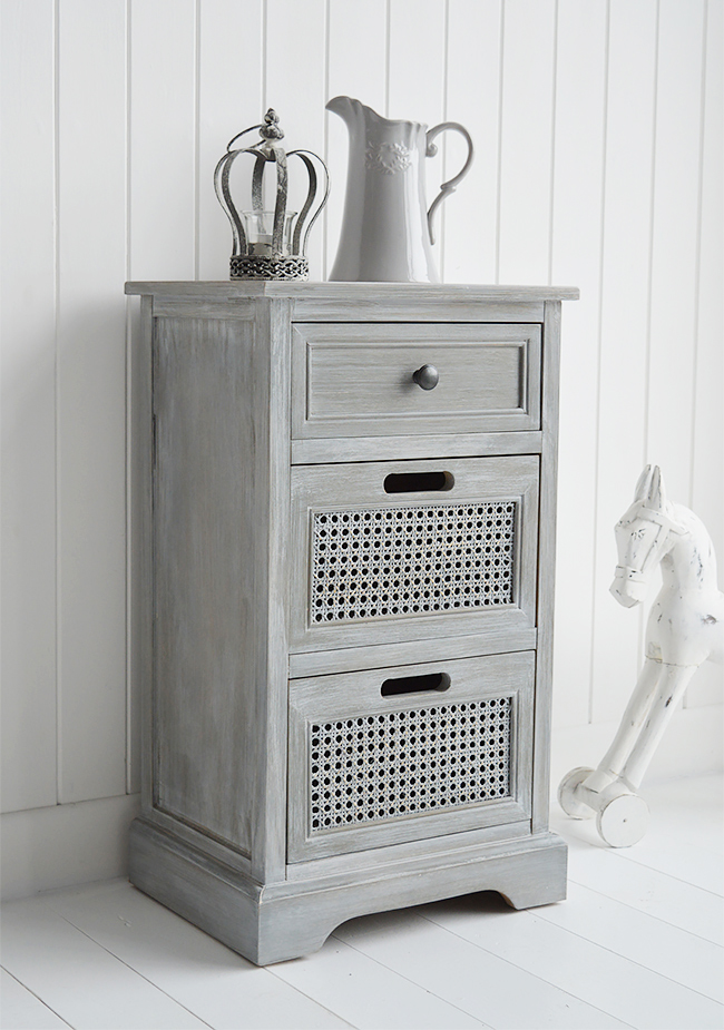 British Colonial Furniture. A grey lamp or bedside table with drawers from side