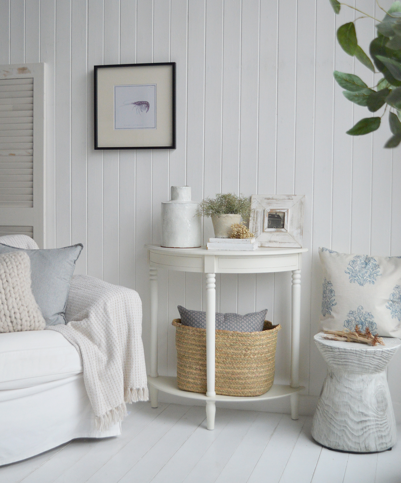 The Cape Ann table captures classic New England charm with its curved shape and turned legs. Its crisp white finish and simple detailing make it an elegant addition to any coastal or country home.