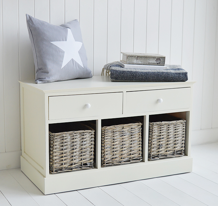 Newbury cream storage seat from the side. A hallway bench with 3 basket drawer and 2 top pullout  drawers