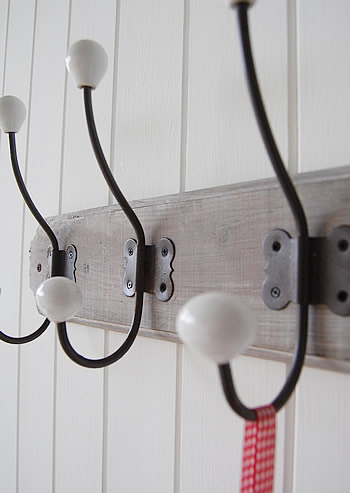 Close of hall coat hooks. Simple hall furniture