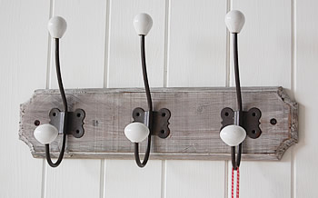 Grey wall hooks and shelves form The Parisian range