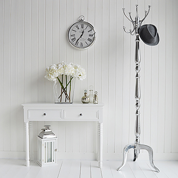 A silver and white hallway with console table and Bentwood coat stand