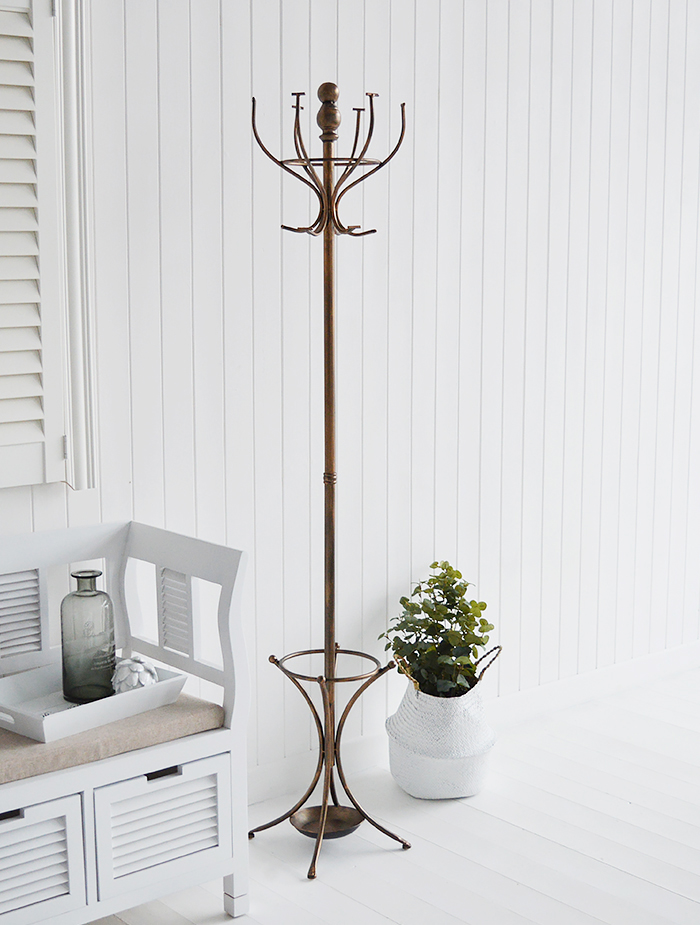 A traditional antiqued copper coloured coat stand for hallway furniture