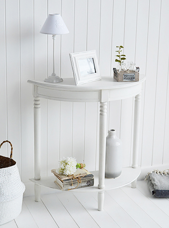 A half moon console table takes up less room