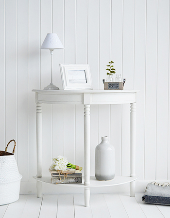 Colonial White Half Moon Console Table, photographed here with white and grey home decor
