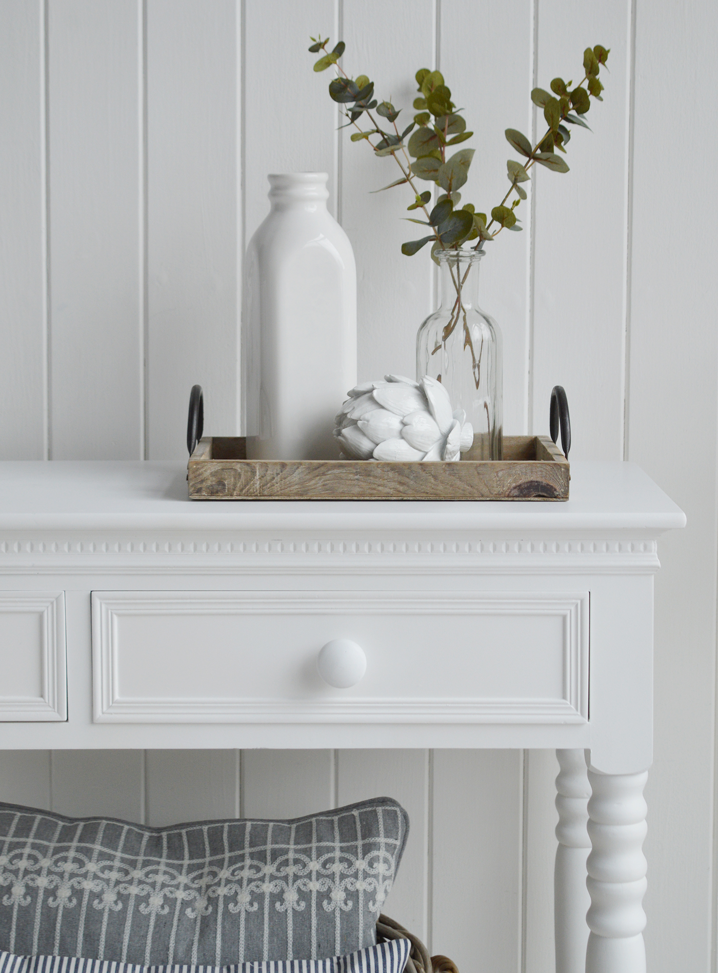 The New England white dressing table with two drawers and chunky knob handles. White furniture for the bedroom for country, coastal and city home interiors and decor