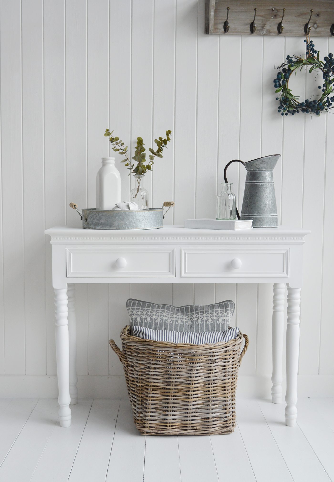 The New England white dressing table with two drawers and chunky knob handles. White furniture for the bedroom for country, coastal and city home interiors and decor