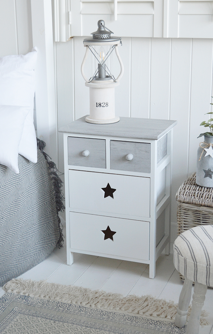 Plymouth wooden cabinet with four drawers in white and grey with cut out star decor from The White Lighthouse for hallway, bedroom and living room furniture. New England country, coastal and city white furniture