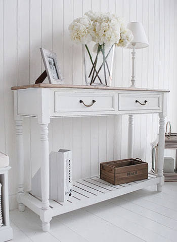 The Brittany console table from a side view for coastal, french and cottage interiors