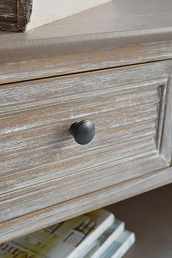 Shows the drawers for this hall furniture piece