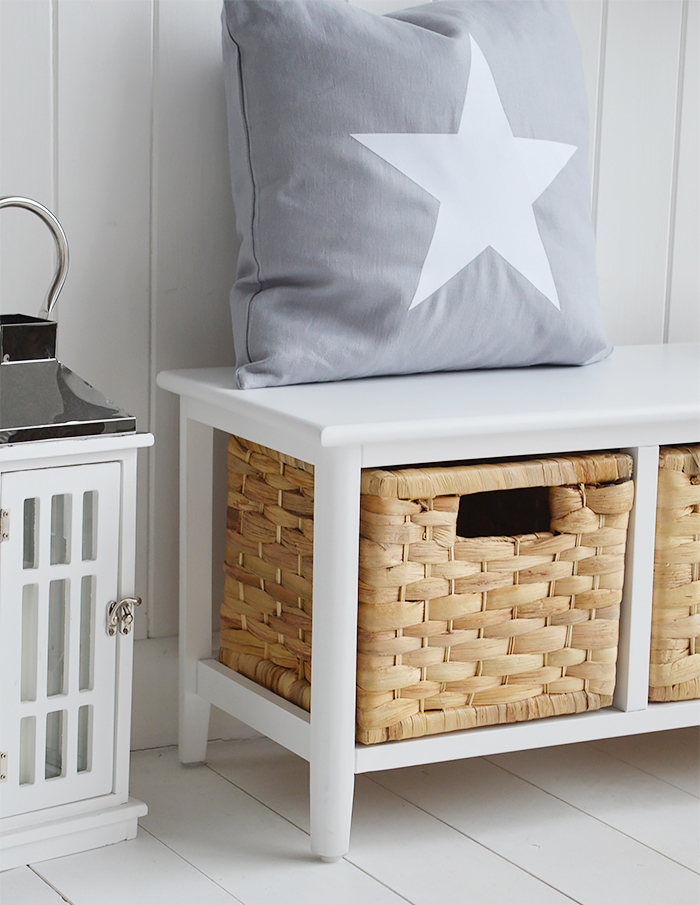 Small white storage bench seat with three baskets