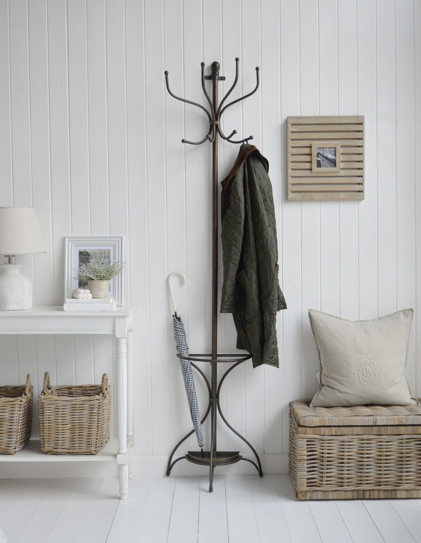 The metal wall mounted coat stand with umbrella holder for New England hallway furniture, providing a secure and organised way to hang coats, bags, or hats