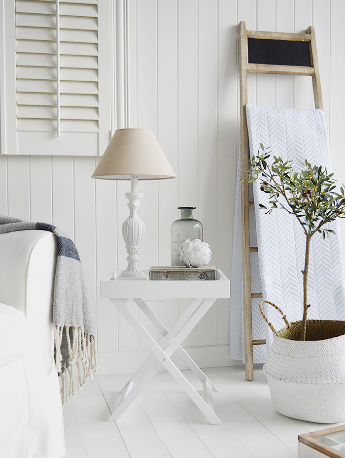 Connecticut white tray butlers table in white living room, versatile furniture