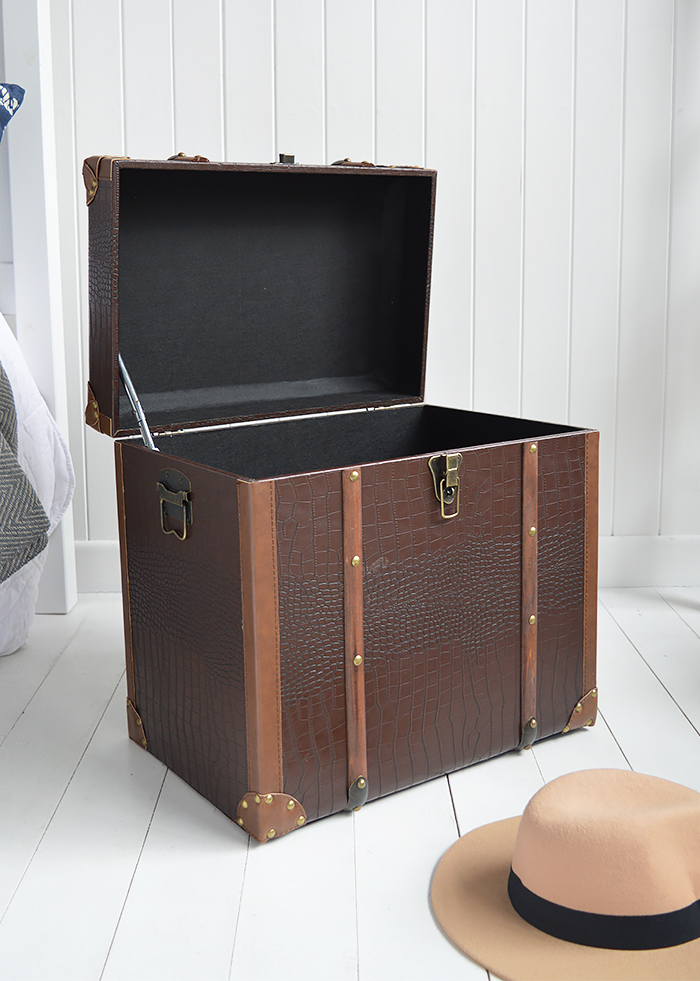 Panama vintage style trunk as a bedside table in New England country and coastal homes interiors UK