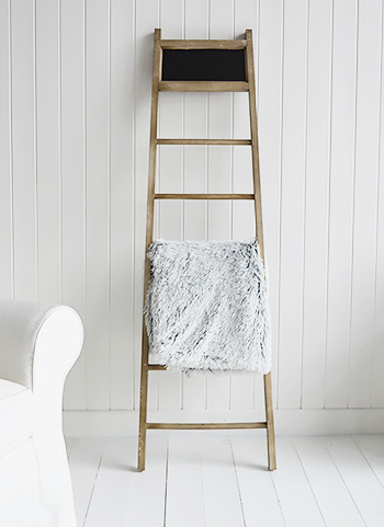 Hang your throws on the decorate ladder