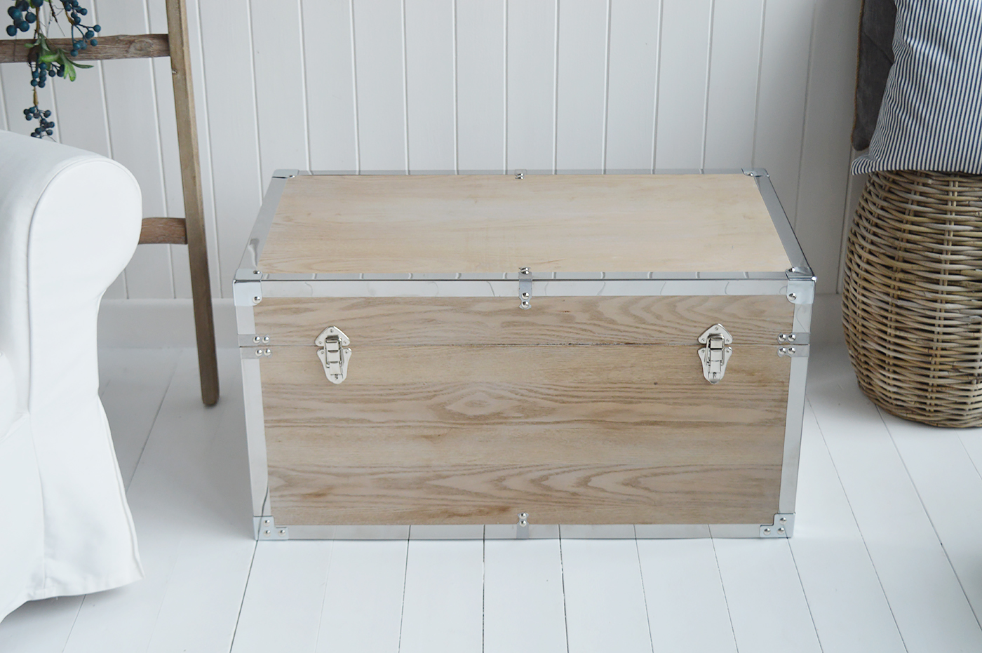 Vermont white washed storage trunks from The White Lighthouse. New England style furniture for coastal, country, farmhouse, cottage and city homes and interiors. Living Room, hallway and bedroom storage furniture
