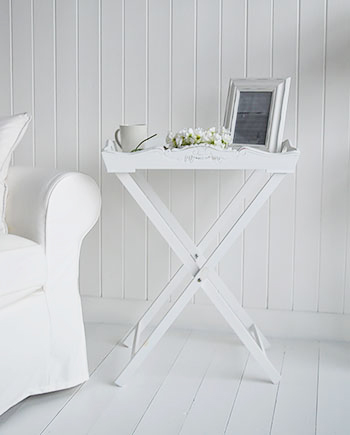 White tray table for small hallway furniture to add a lamp.