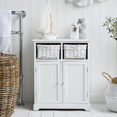 The simplicity of the straight lines of he Maine reange of white bathroom storage furniture and cabinets and white colour offer this cabinet the abilty to complement any of our New England styles of interiors for the bathroom in country, coastal and city homes