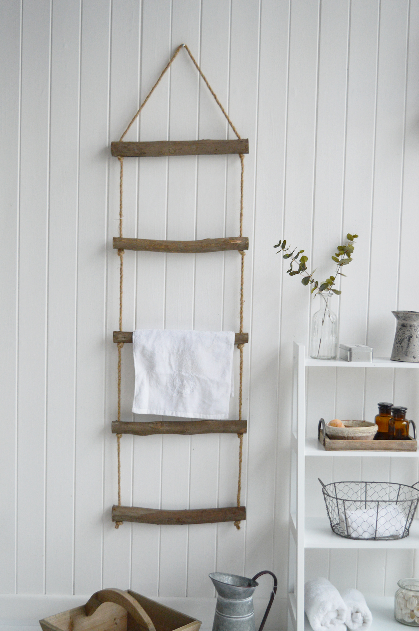 A rope towel ladder to hang towels in bathroom or blanket ladder for the living room. from The White Lighthouse Furniture , New England interiors and furniture for the hallway, living room, bedroom and bathroom