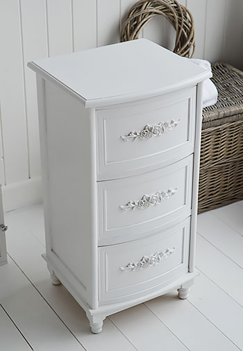 Pretty white bathroom drawers for a cottage style bathroom